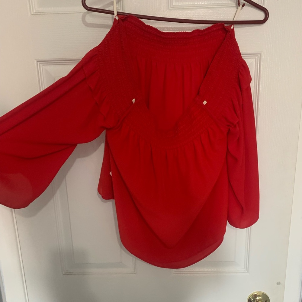 Off the shoulder red shirt